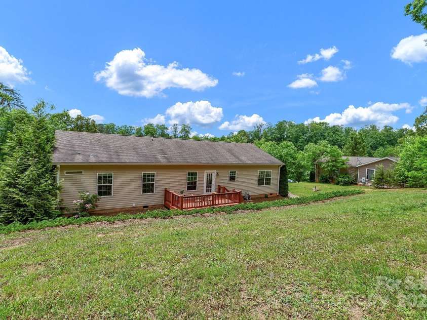 52 Luther Cove Road, Candler, NC 28715.  MLS# CAR4257069, YatesRealty ID 16701. Back of House