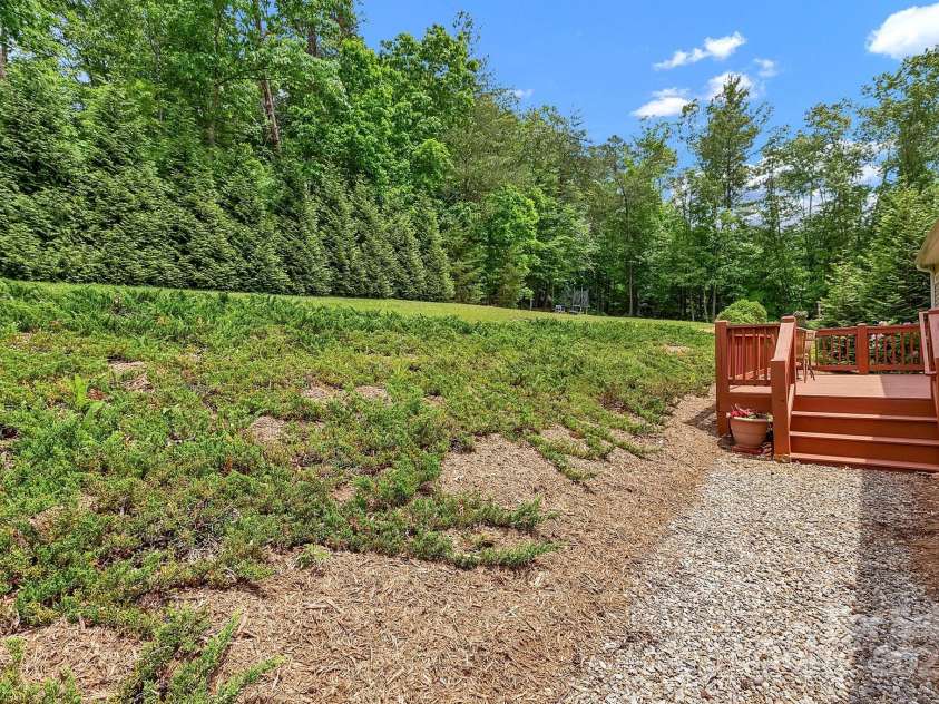 52 Luther Cove Road, Candler, NC 28715.  MLS# CAR4257069, YatesRealty ID 16701. Back Yard