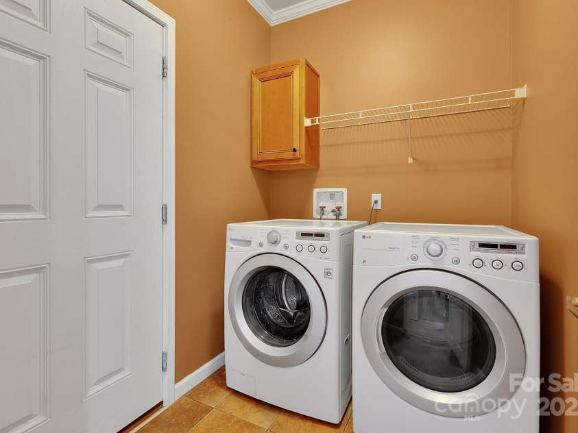 52 Luther Cove Road, Candler, NC 28715.  MLS# CAR4257069, YatesRealty ID 16701. Laundry