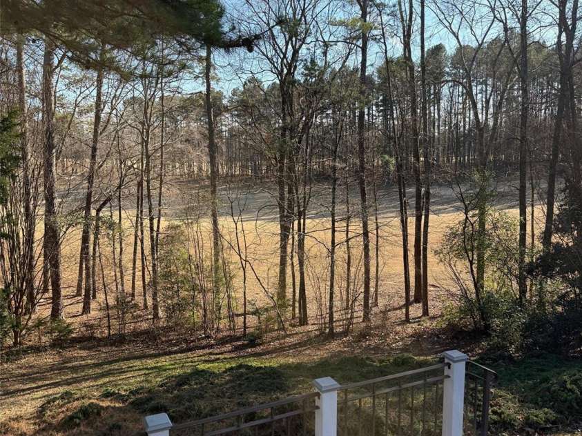 10317 Clubhouse View Lane, Mint Hill, NC 28227.  MLS# CAR4313270, YatesRealty ID 16705. Fall golf course views.