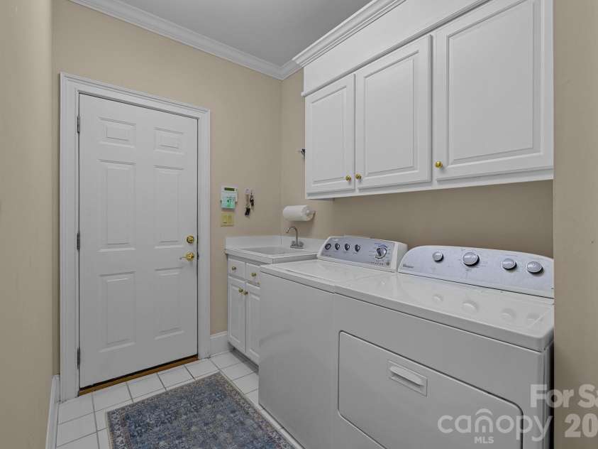 10317 Clubhouse View Lane, Mint Hill, NC 28227.  MLS# CAR4313270, YatesRealty ID 16705. Laundry room w/closet.