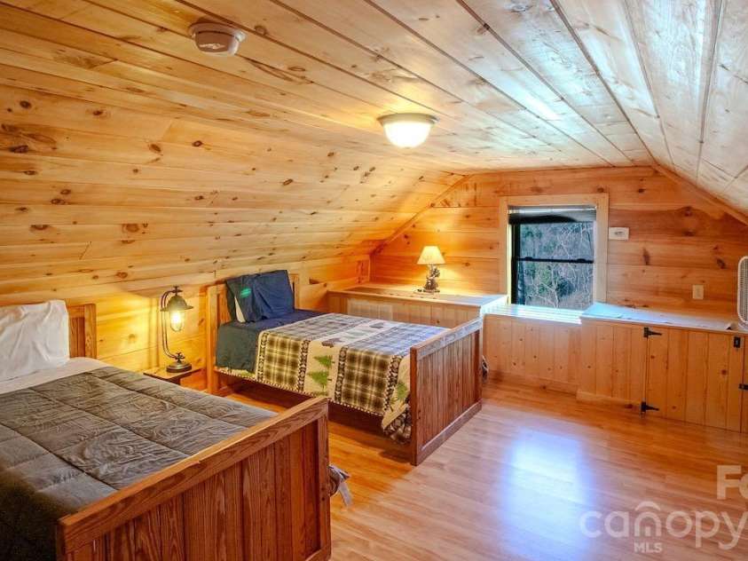 187 Gardeners Cove, Whittier, NC 28789.  MLS# CAR4355079, YatesRealty ID 16705. Sleeping area in bonus space