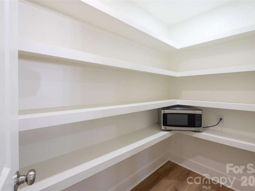 228 Brumley Road, Mooresville, NC 28115.  MLS# CAR4322912, YatesRealty ID 16706. Pantry with Microwave