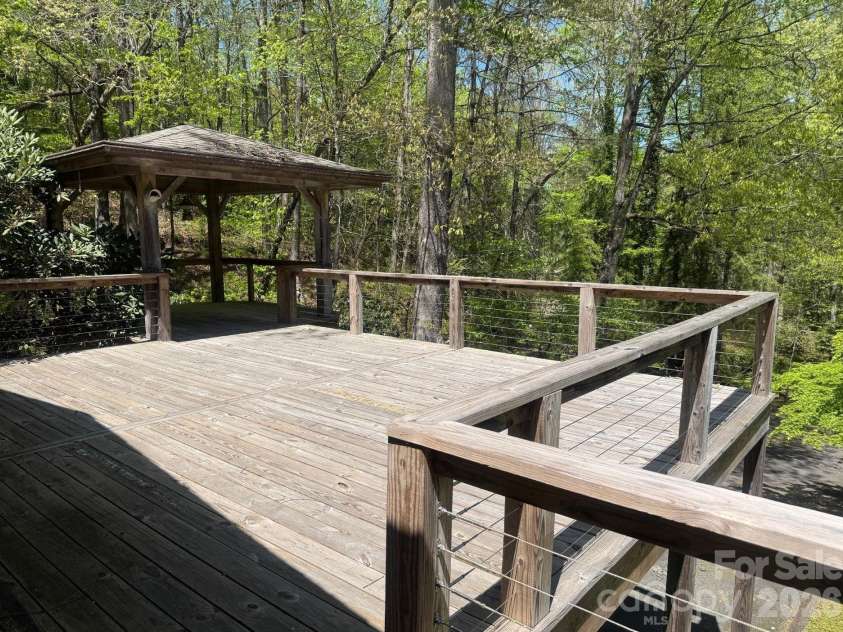 427 Wingfield Way, Brevard, NC 28712.  MLS# CAR4372461, YatesRealty ID 16709. Deck off the home 