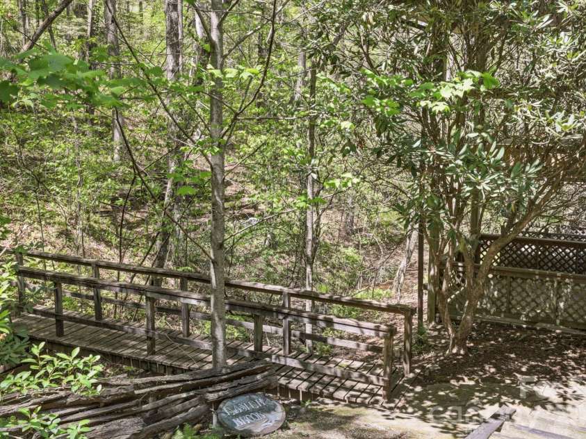 427 Wingfield Way, Brevard, NC 28712.  MLS# CAR4372461, YatesRealty ID 16709. Many small bridges on the property to access trails 