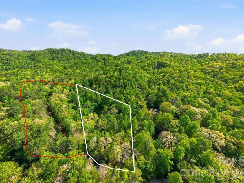 427 Wingfield Way, Brevard, NC 28712.  MLS# CAR4372461, YatesRealty ID 16709. This additional 2.04 acres can be purchased to make 6+ acres 
