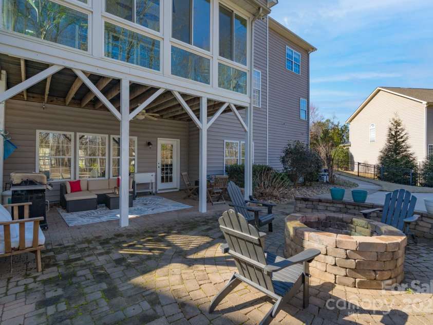 228 Black Mountain Drive, Fort Mill, SC 29708.  MLS# CAR4225909, YatesRealty ID 1671. Backyard with built-in fire pit