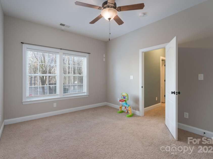 228 Black Mountain Drive, Fort Mill, SC 29708.  MLS# CAR4225909, YatesRealty ID 1671. Basement guest bedroom #5