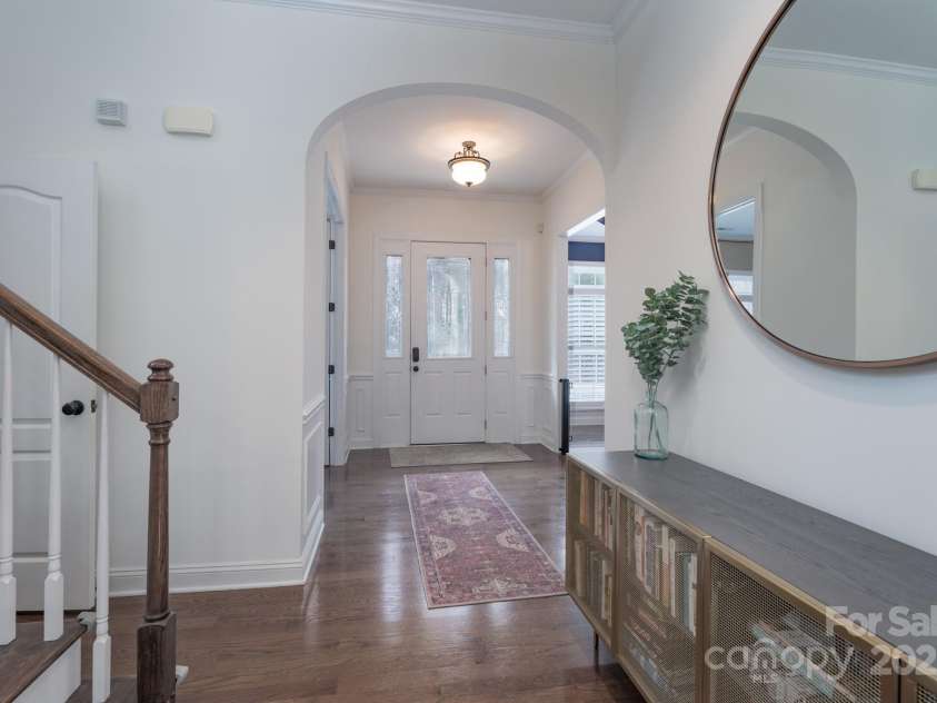 228 Black Mountain Drive, Fort Mill, SC 29708.  MLS# CAR4225909, YatesRealty ID 1671. From family room to front door