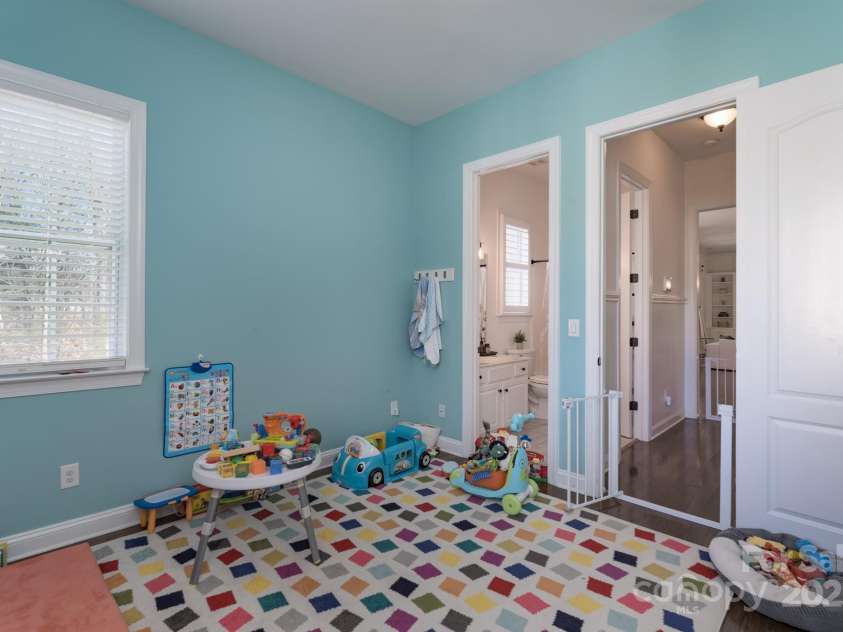 228 Black Mountain Drive, Fort Mill, SC 29708.  MLS# CAR4225909, YatesRealty ID 1671. Main floor guest bedroom #1