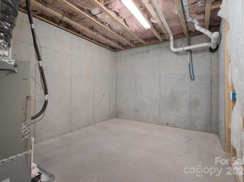 228 Black Mountain Drive, Fort Mill, SC 29708.  MLS# CAR4225909, YatesRealty ID 1671. Second basement storage room