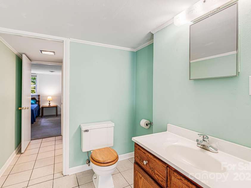 38 Westridge Drive, Asheville, NC 28803.  MLS# CAR4264261, YatesRealty ID 16711. Basement Bathroom