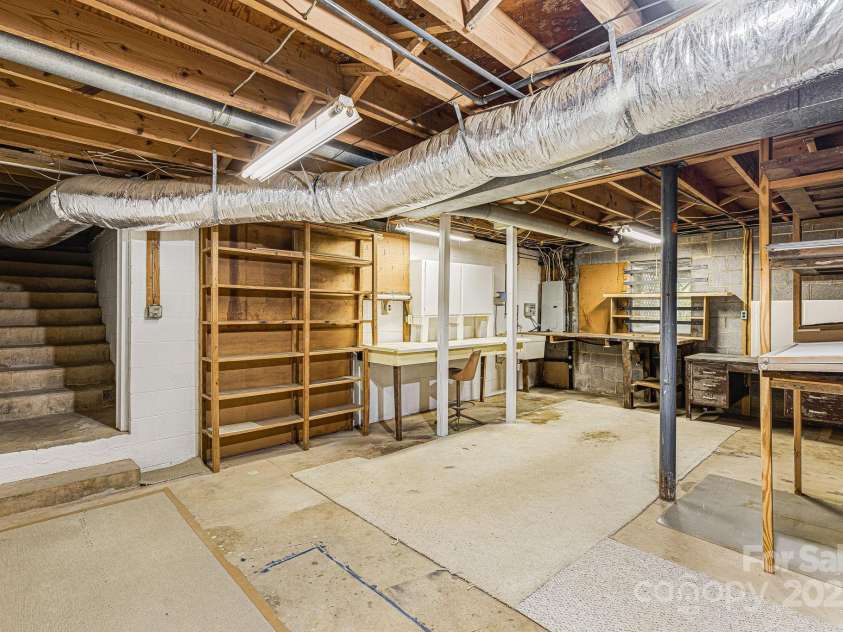 38 Westridge Drive, Asheville, NC 28803.  MLS# CAR4264261, YatesRealty ID 16711. Unfinished Basement