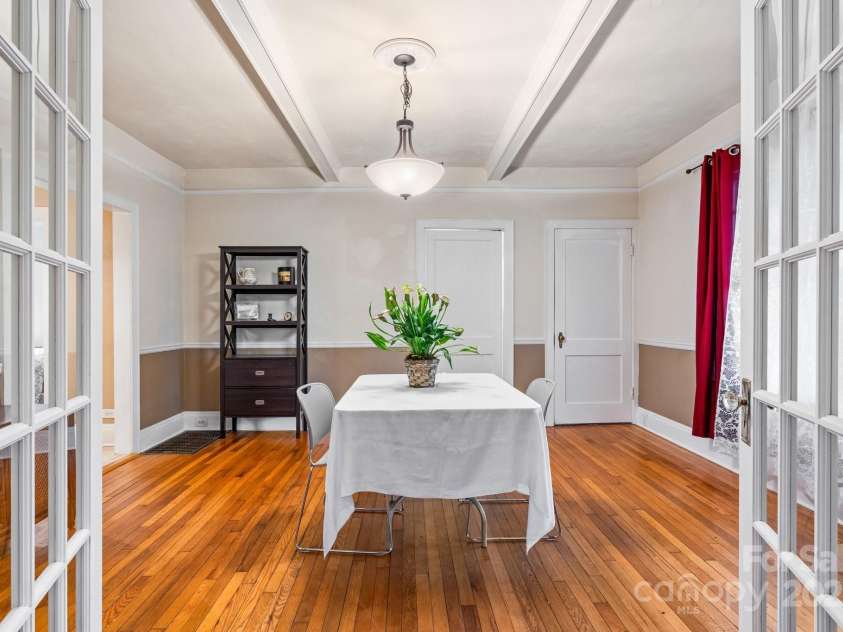 218 5th Street, Hickory, NC 28602.  MLS# CAR4251114, YatesRealty ID 16712. Parlor or dining area with glass frame doors