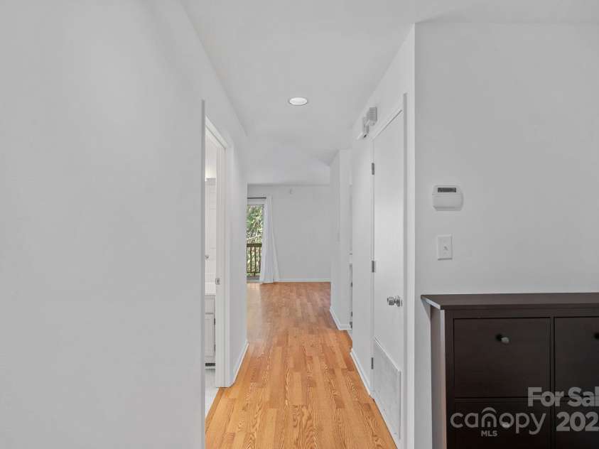 3302 Selwyn Farms Lane, Charlotte, NC 28209.  MLS# CAR4311763, YatesRealty ID 16714. Entry way with shoe caddy to keep your new space clean