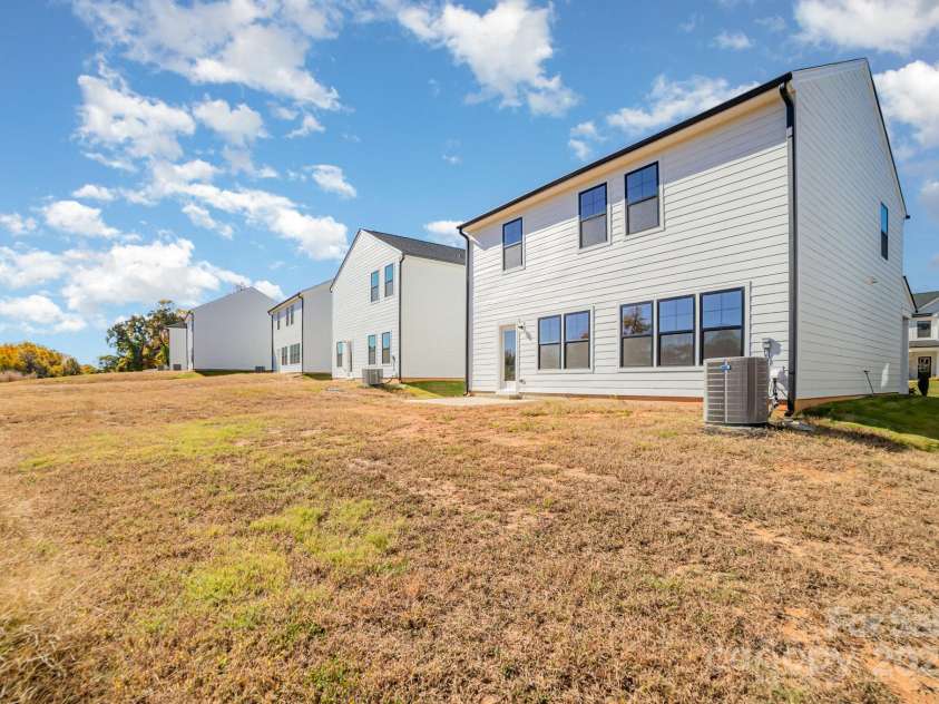 107 Silverwood Court, Mooresville, NC 28115.  MLS# CAR4320107, YatesRealty ID 1672. Back Exterior 