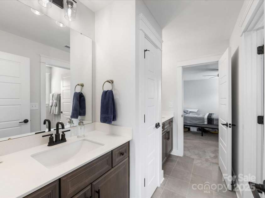 702 Yucatan Drive, Waxhaw, NC 28173.  MLS# CAR4223915, YatesRealty ID 1672. 2 vanities in connecting bathroom