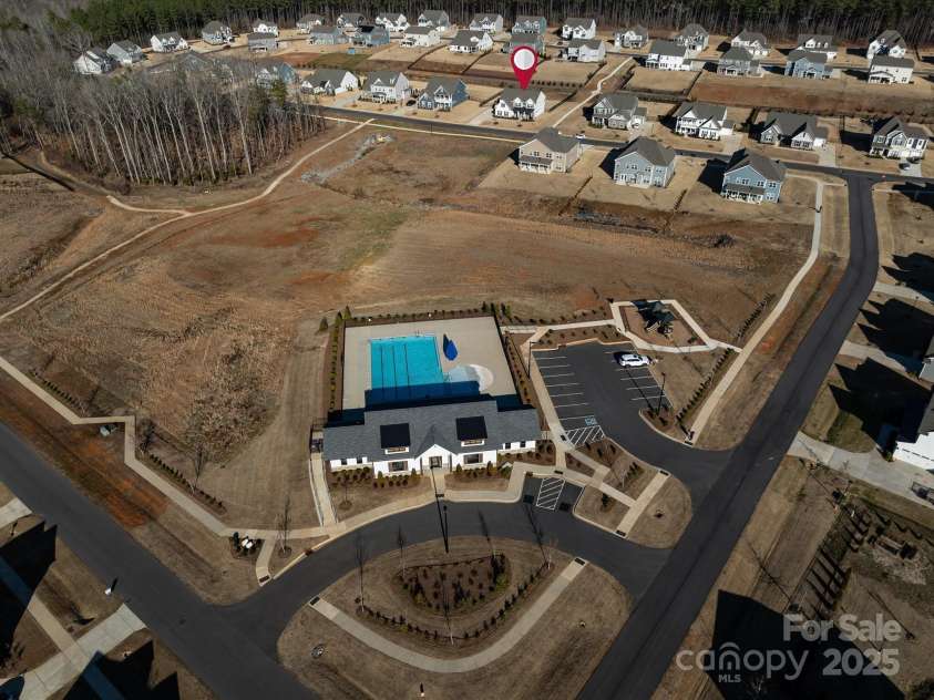 702 Yucatan Drive, Waxhaw, NC 28173.  MLS# CAR4223915, YatesRealty ID 1672. Community Pool and cabana