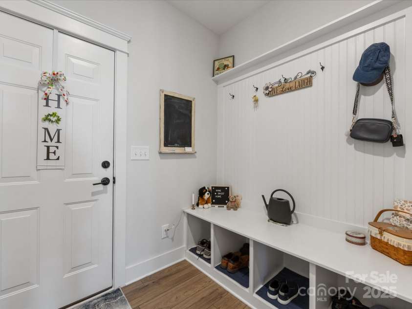 702 Yucatan Drive, Waxhaw, NC 28173.  MLS# CAR4223915, YatesRealty ID 1672. Drop Zone in mud room between garage and kitchen