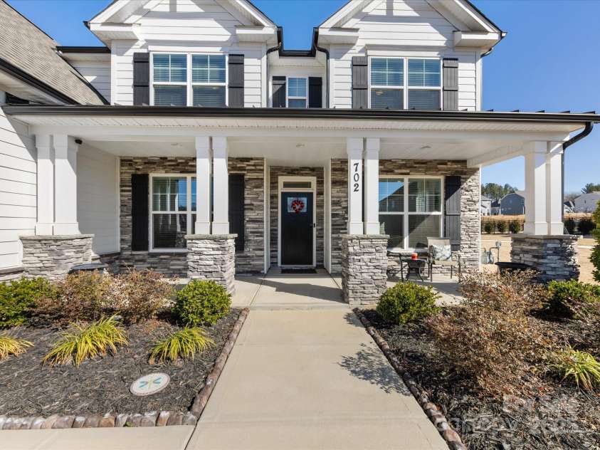 702 Yucatan Drive, Waxhaw, NC 28173.  MLS# CAR4223915, YatesRealty ID 1672. Inviting Front porch
