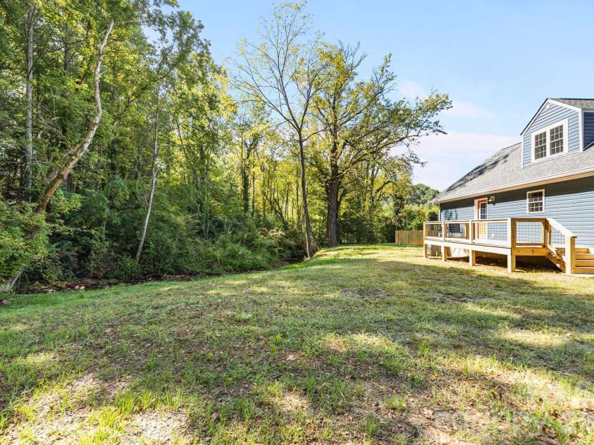 215 McCoy Cove, Black Mountain, NC 28711.  MLS# CAR4333033, YatesRealty ID 16724. Flat back yard!