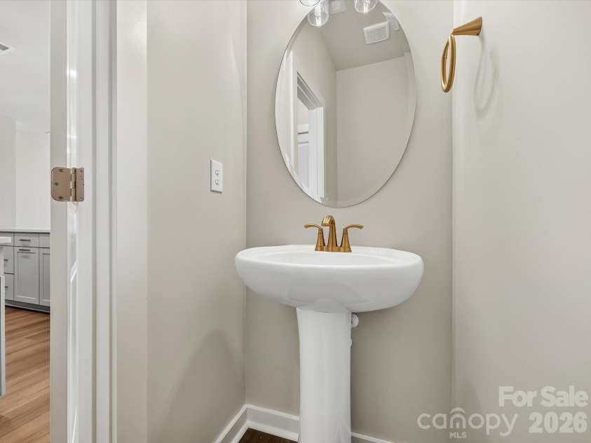 276 Alluvium Lane, Waxhaw, NC 28173.  MLS# CAR4371540, YatesRealty ID 16734. Powder room
