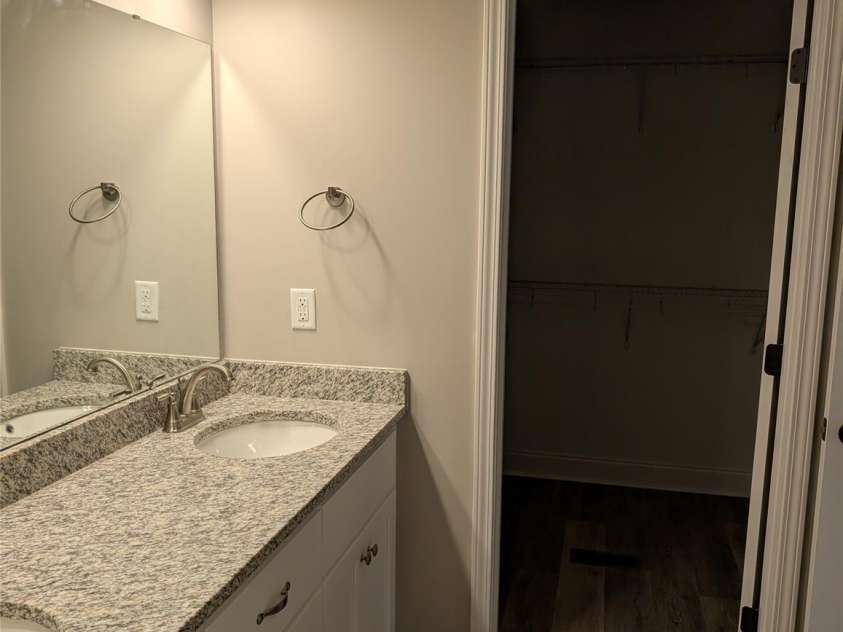 4178 Saltwood Drive, Hickory, NC 28602.  MLS# CAR4345718, YatesRealty ID 1674. Master Bath Leading into Walk in Closet
