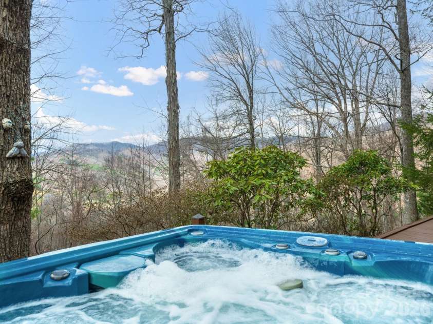 1160 High Rock Mountain Road, Marshall, NC 28753.  MLS# CAR4355296, YatesRealty ID 16741. Soak your cares away! 