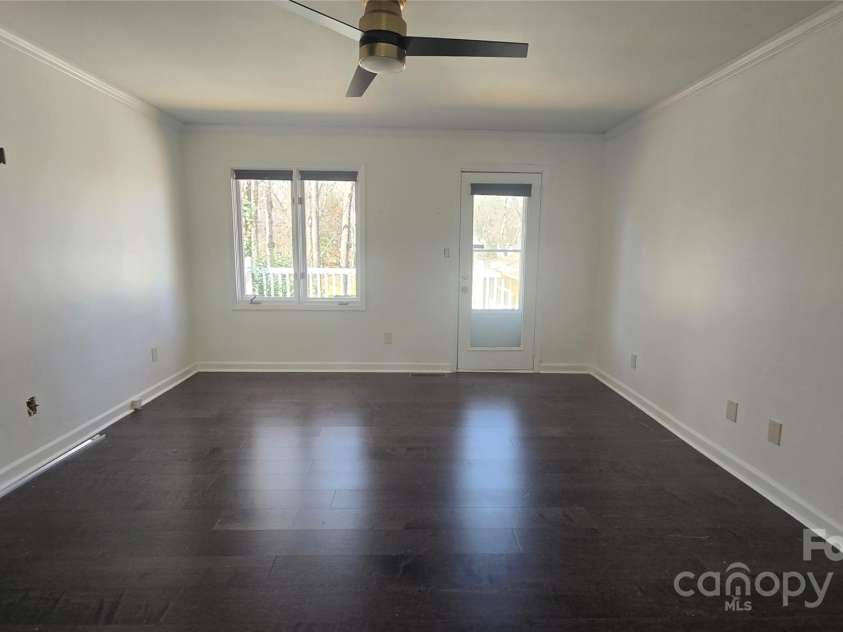 16425 Grapperhall Drive, Huntersville, NC 28078.  MLS# CAR4203228, YatesRealty ID 16749. Primary bedroom on main level with access to  private back deck