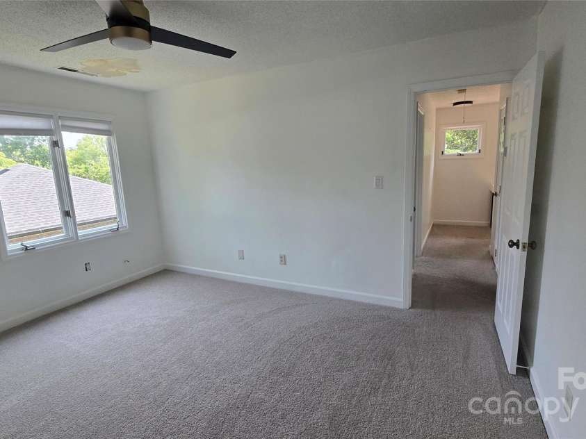 16425 Grapperhall Drive, Huntersville, NC 28078.  MLS# CAR4203228, YatesRealty ID 16749. Second bedroom upstairs with walk in closet and organizer