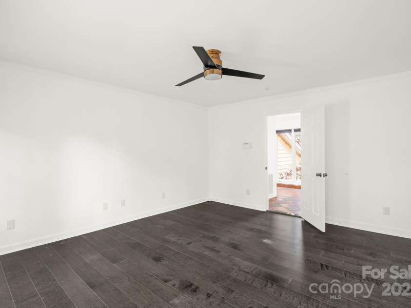 16425 Grapperhall Drive, Huntersville, NC 28078.  MLS# CAR4323175, YatesRealty ID 16749. Primary bedroom with door to outside deck