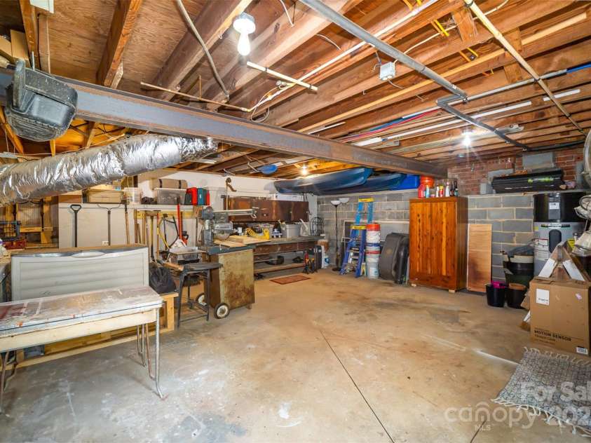 118 Spicewood Circle, Troutman, NC 28166.  MLS# CAR4252159, YatesRealty ID 16755. Basement workshop