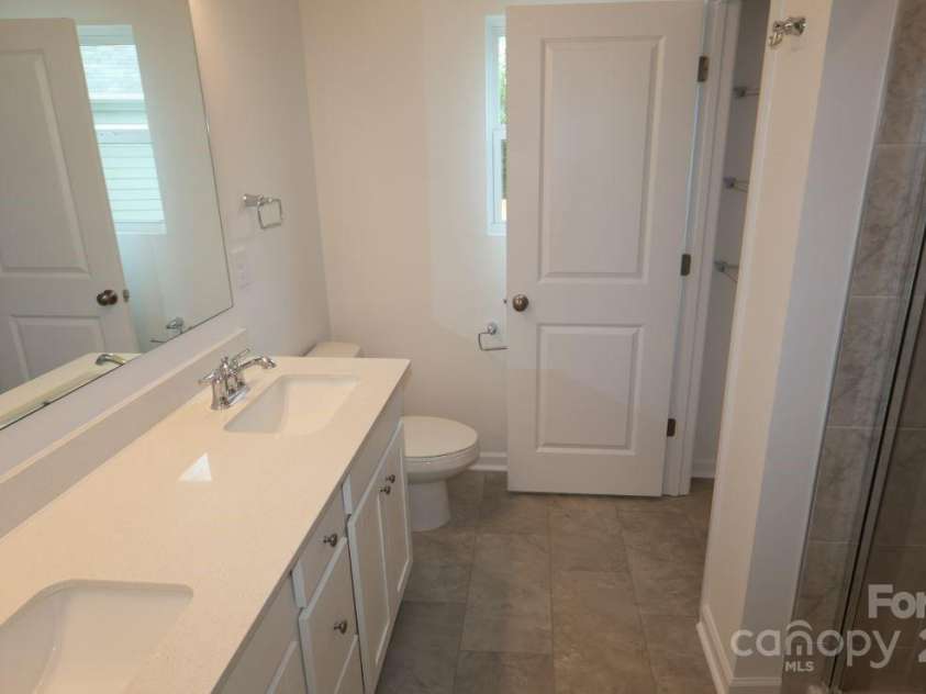 1922 Highland Park Drive, Charlotte, NC 28269.  MLS# CAR4264504, YatesRealty ID 16757. Owners bathroom