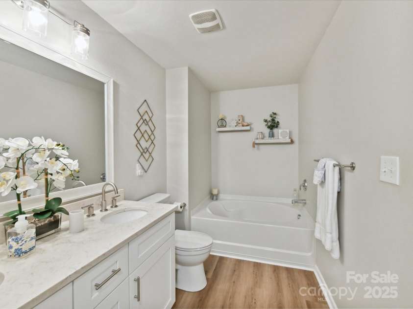 2005 Grimley Lane, Fort Mill, SC 29707.  MLS# CAR4258987, YatesRealty ID 16759. Updated Primary Bath w/Quartz Counter and Framed Mirror