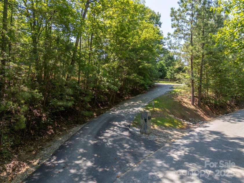 599 Shoal Creek Trail, Nebo, NC 28761.  MLS# CAR4280123, YatesRealty ID 1676. Driveway to home
