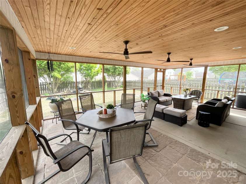 1096 Mountain Laurel Court, Matthews, NC 28104.  MLS# CAR4197440, YatesRealty ID 16761. Screened porch