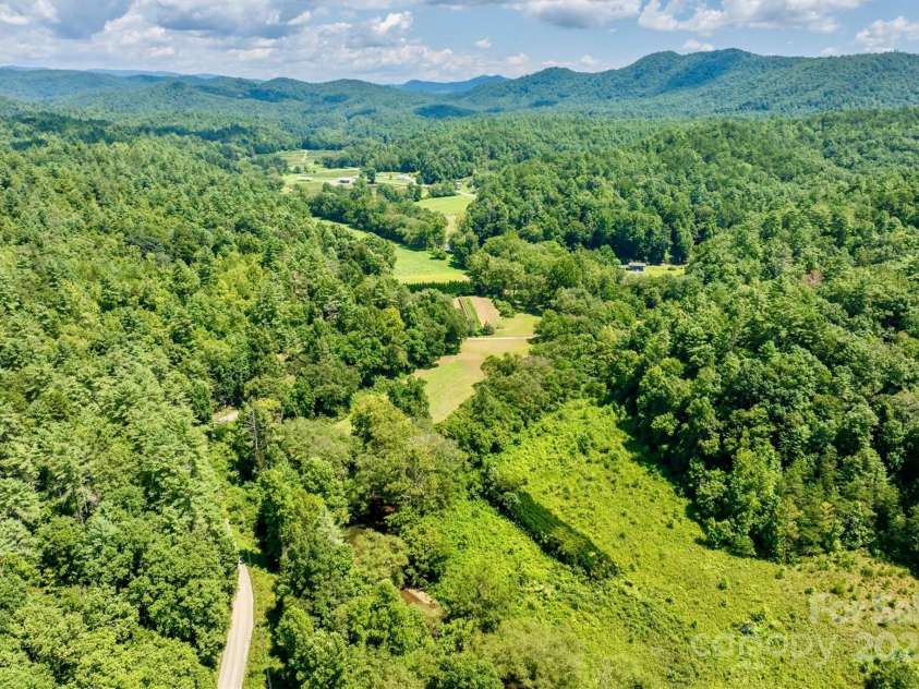 3050 Old Johns River Road, Collettsville, NC 28611.  MLS# CAR4174150, YatesRealty ID 16769. Pisgah National Forest and the Blue Ridge Mountains surround this valley