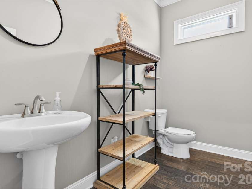 121 Leeward Shoals Lane, Mooresville, NC 28117.  MLS# CAR4367993, YatesRealty ID 16772. Half bath on main