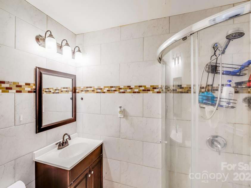 2614 Thornton Road, Charlotte, NC 28208.  MLS# CAR4245913, YatesRealty ID 16773. Hall Bathroom