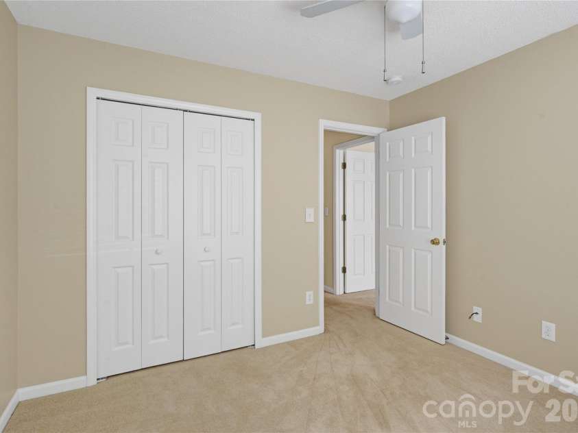 8772 Robinson Forest Drive, Charlotte, NC 28277.  MLS# CAR4389286, YatesRealty ID 16774. Bedroom 2 with closet