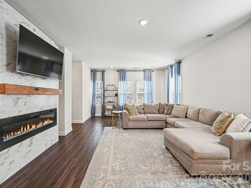 4012 Yucca Alley, Charlotte, NC 28217.  MLS# CAR4334490, YatesRealty ID 16776. Unique built-in fireplace