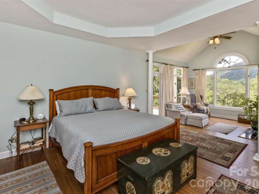 25 Windsong Drive, Fairview, NC 28730.  MLS# CAR4370725, YatesRealty ID 16777. Door leads to deck from Primary