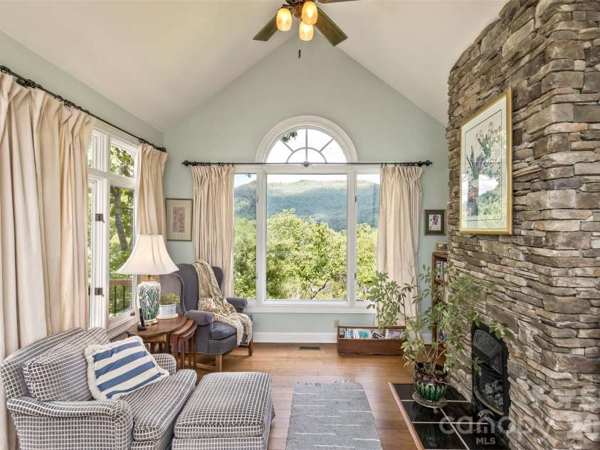 25 Windsong Drive, Fairview, NC 28730.  MLS# CAR4370725, YatesRealty ID 16777. Gas Coal Fireplace in Primary