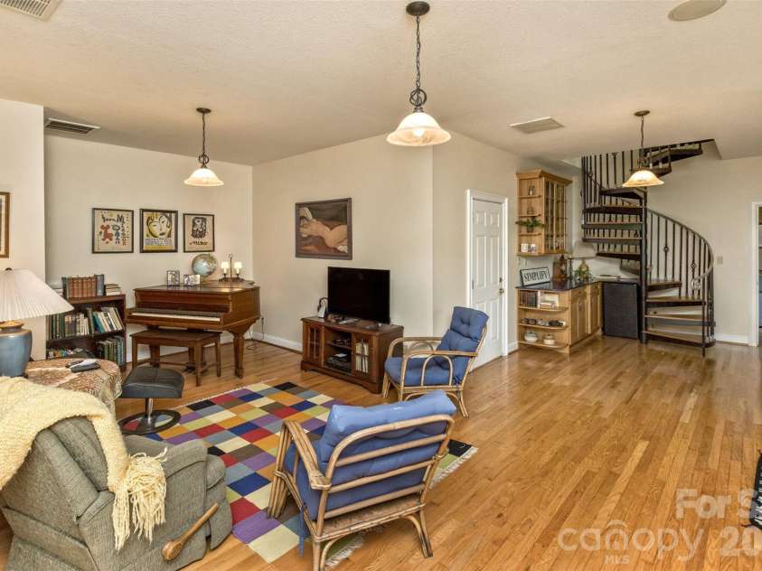 25 Windsong Drive, Fairview, NC 28730.  MLS# CAR4370725, YatesRealty ID 16777. Great area for many different uses, lower level leads to second deck