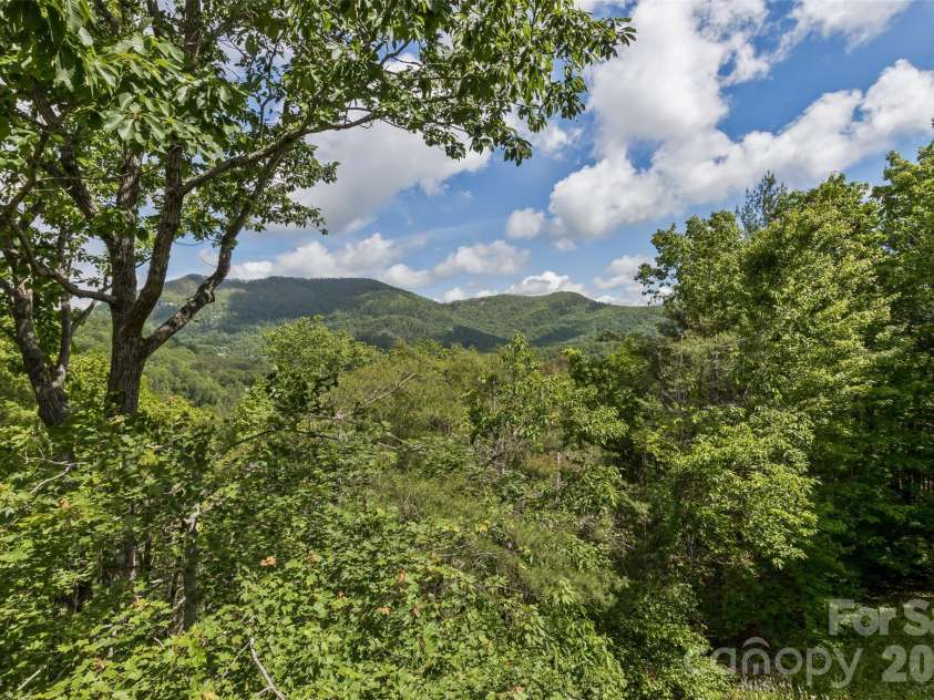 25 Windsong Drive, Fairview, NC 28730.  MLS# CAR4370725, YatesRealty ID 16777. Let this view greet You!