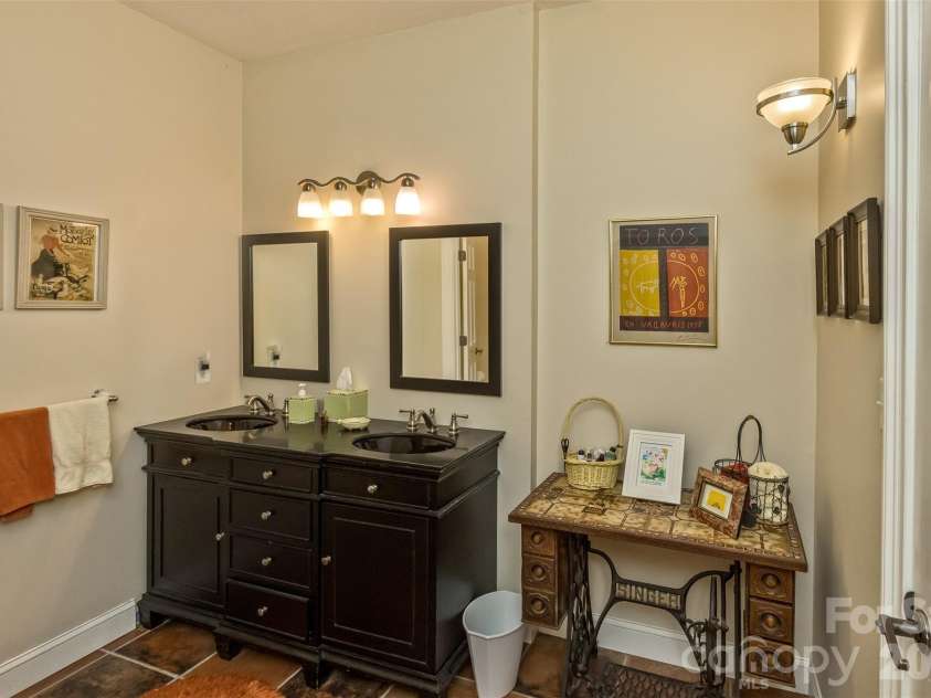 25 Windsong Drive, Fairview, NC 28730.  MLS# CAR4370725, YatesRealty ID 16777. Lower level bathroom