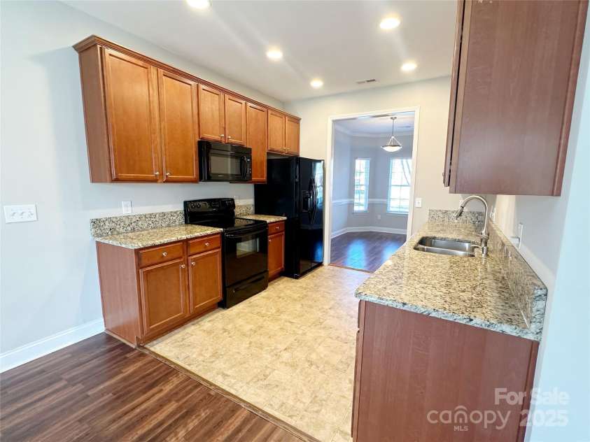 4143 Kenton Glenn Court, Concord, NC 28027.  MLS# CAR4286891, YatesRealty ID 16777. Kitchen view