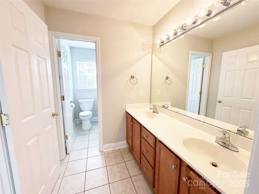 4143 Kenton Glenn Court, Concord, NC 28027.  MLS# CAR4286891, YatesRealty ID 16777. Primary Bathroom