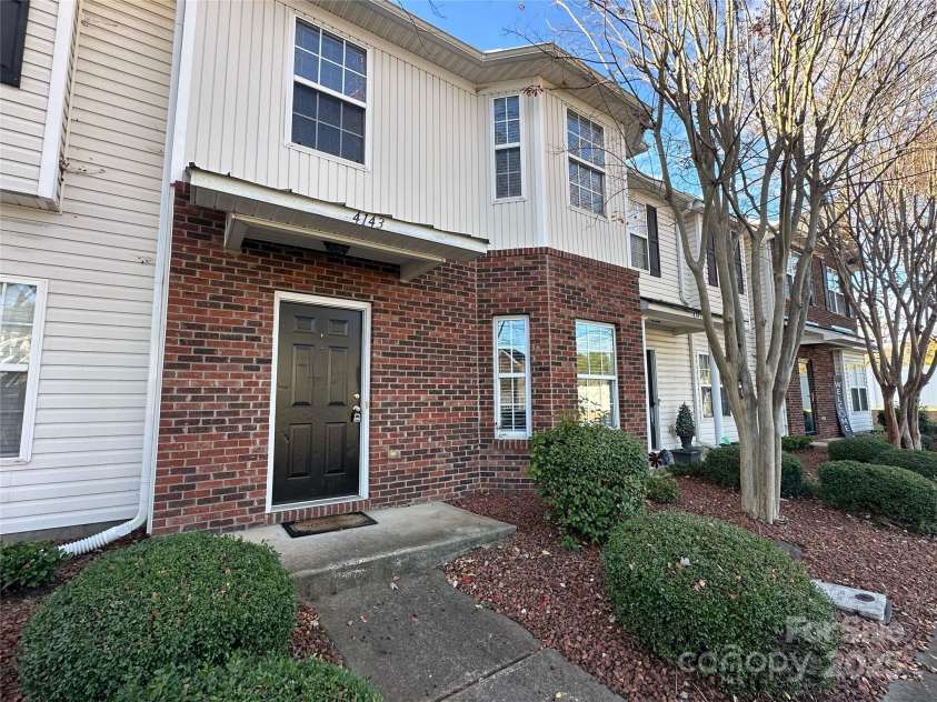 4143 Kenton Glenn Court, Concord, NC 28027.  MLS# CAR4286891, YatesRealty ID 16777. Streetside view of townhome
