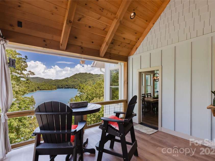 216 Alarka Point, Bryson City, NC 28713.  MLS# CAR4292798, YatesRealty ID 1678. Side Deck off Dining